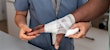 Man at urgent care for burn on hand