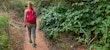 Woman hiking and avoiding poison plants in alabama